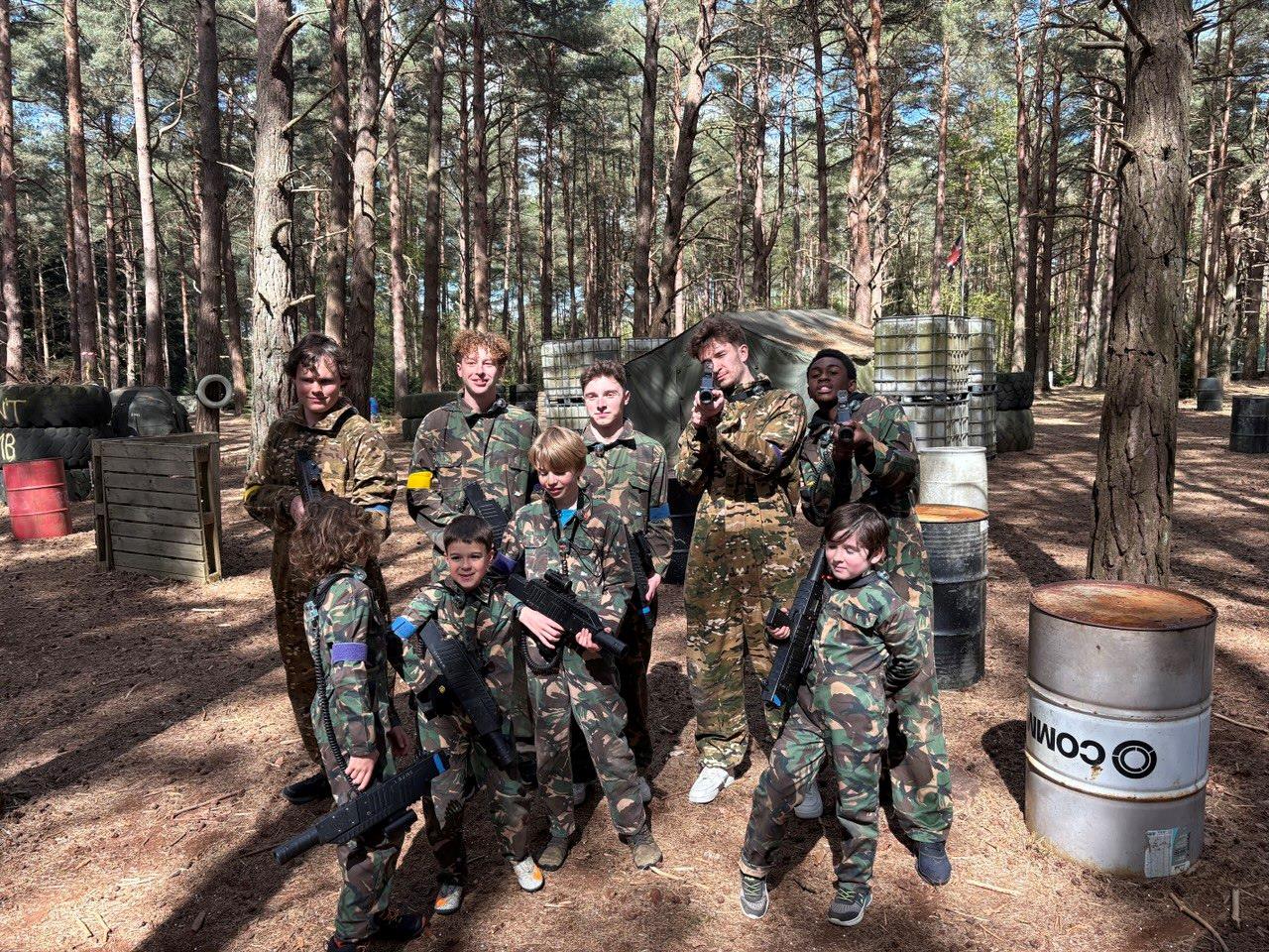 Mixed group of players in the woodland laser tag arena