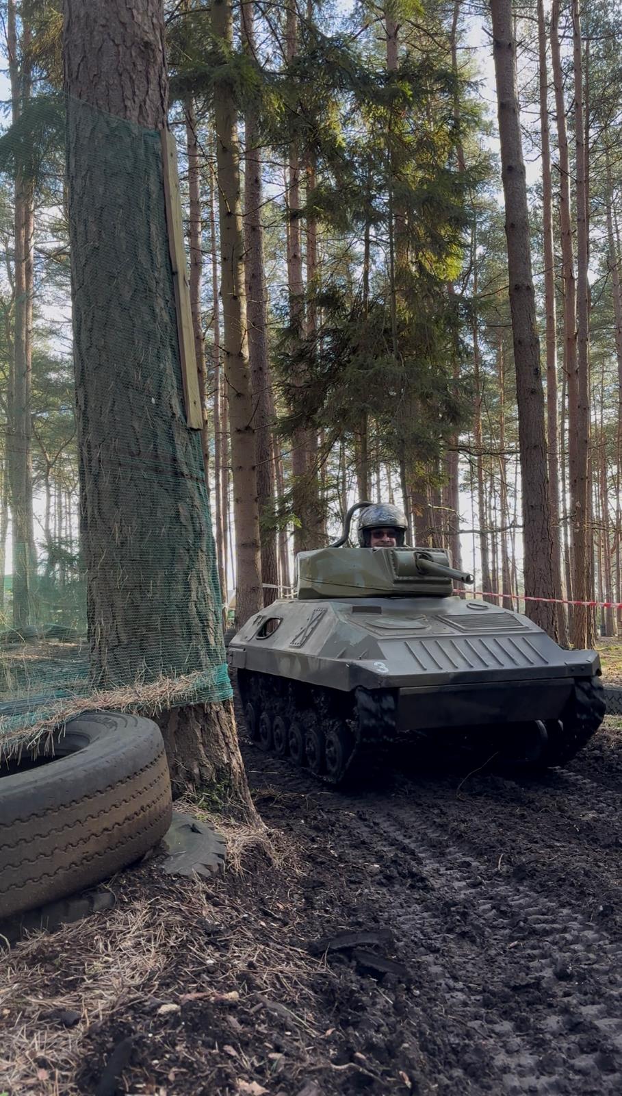 Mini tank parked on the woodland course ready for a gift voucher session